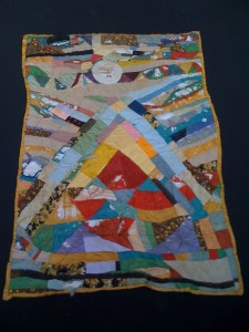 Last pic of this quilt before it it bit the big one. It had multiple layers of fabric in all sections